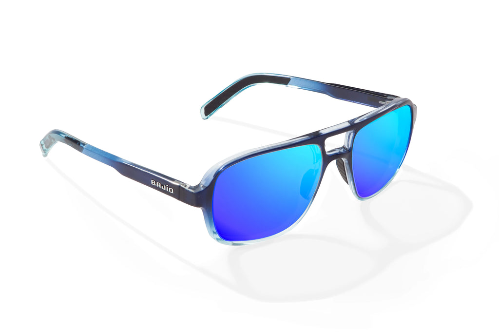 Angled view of Blue Sky Gloss 12 South Bajio beach sunglasses, bio-based nylon frames with blue mirror polarized lenses, large-fit premium, built in sun ledge and sturdy barrel hinges, ideal for fishing and outdoor use.