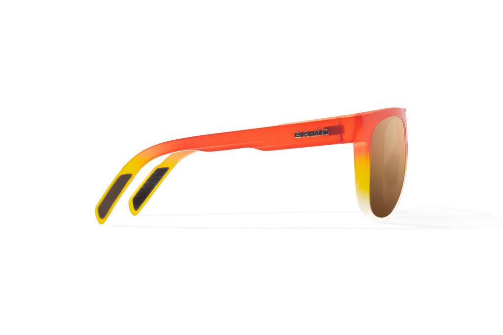 Side view of Red Yellow Sky Matte Chelem Bajio surf sunglasses, bio-based nylon frames with copper polarized lenses, medium wrap, medium fit, premium built in sun ledge and flex hinges, ideal for fishing and outdoor use.