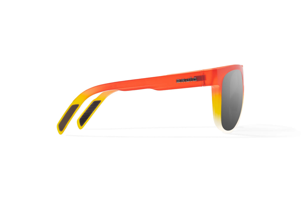 Side view of Red Yellow Sky Matte Chelem Bajio surf sunglasses, bio-based nylon frames with gray polarized lenses, medium wrap, medium fit, premium built in sun ledge and flex hinges, ideal for fishing and outdoor use.