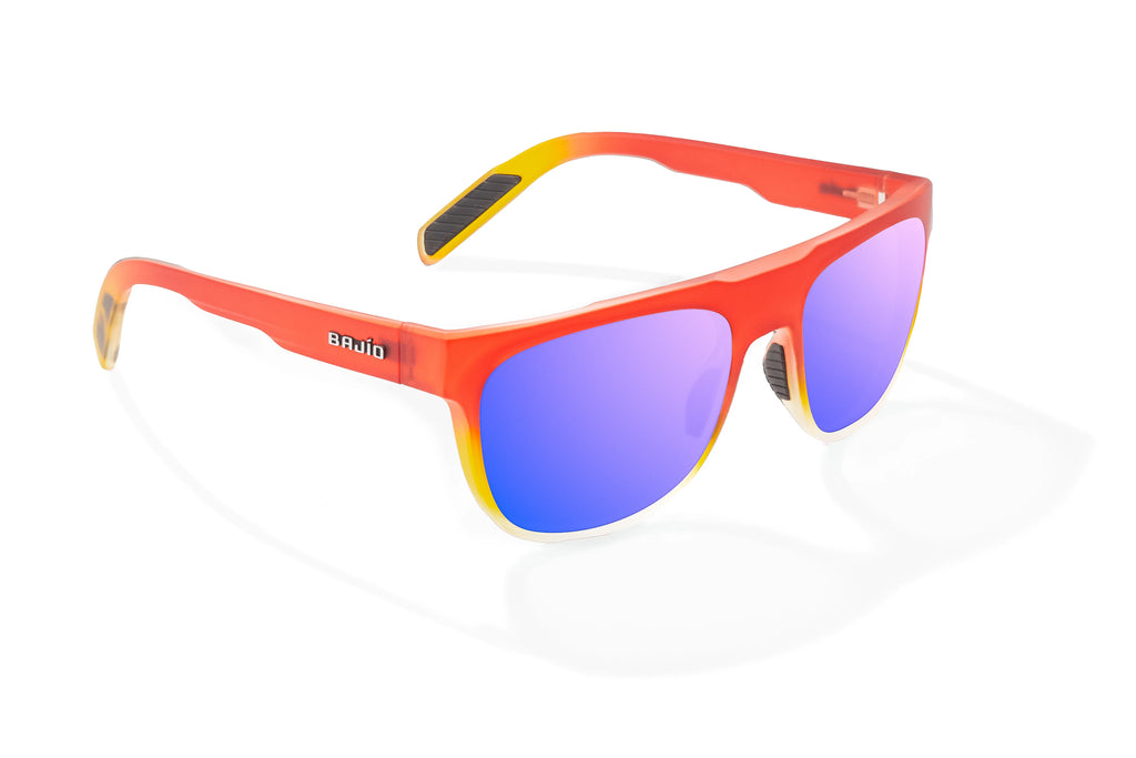 Angled view of Red Yellow Sky Matte Chelem Bajio surf sunglasses, bio-based nylon frames with violet mirror polarized lenses, medium wrap, medium fit, premium built in sun ledge and flex hinges, ideal for fishing and outdoor use.