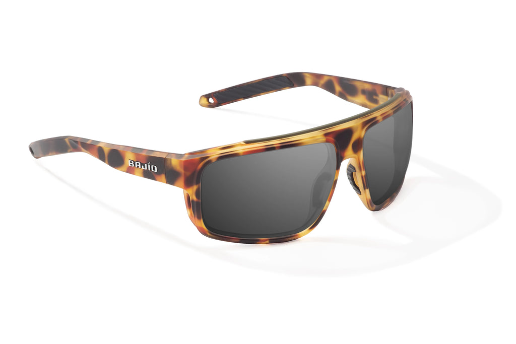 Angled view of Green Water Matte Greenland Bajio tech angler sunglasses, bio-based nylon frames with gray polarized lenses, full wrap, large fit, premium built in sun ledge and flex hinges, ideal for fishing and outdoor use.