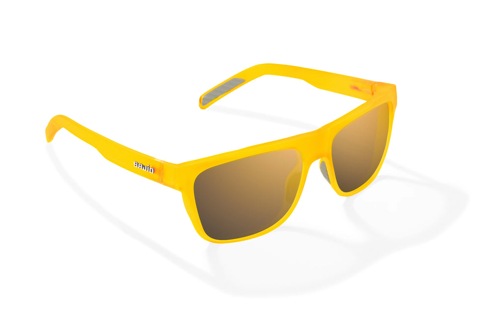 Angled view of Yellow Glass Matte Hopedale Bajio surf sunglasses, bio-based nylon frames with copper polarized lenses, medium wrap, large fit, premium built in sun ledge and flex hinges, ideal for fishing and outdoor use.