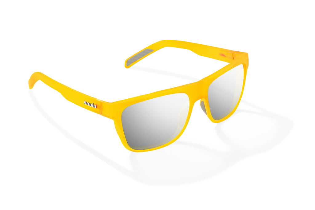 Angled view of Yellow Glass Matte Hopedale Bajio surf sunglasses, bio-based nylon frames with silver mirror polarized lenses, medium wrap, large fit, premium built in sun ledge and flex hinges, ideal for fishing and outdoor use.