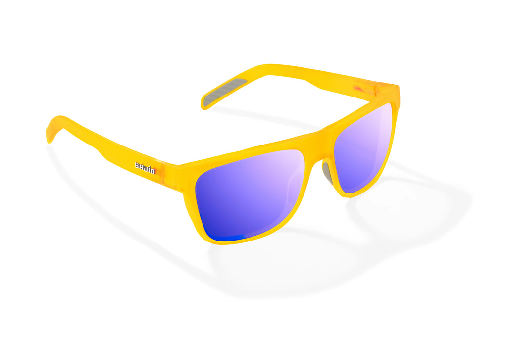 Angled view of Yellow Glass Matte Hopedale Bajio surf sunglasses, bio-based nylon frames with violet mirror polarized lenses, medium wrap, large fit, premium built in sun ledge and flex hinges, ideal for fishing and outdoor use.
