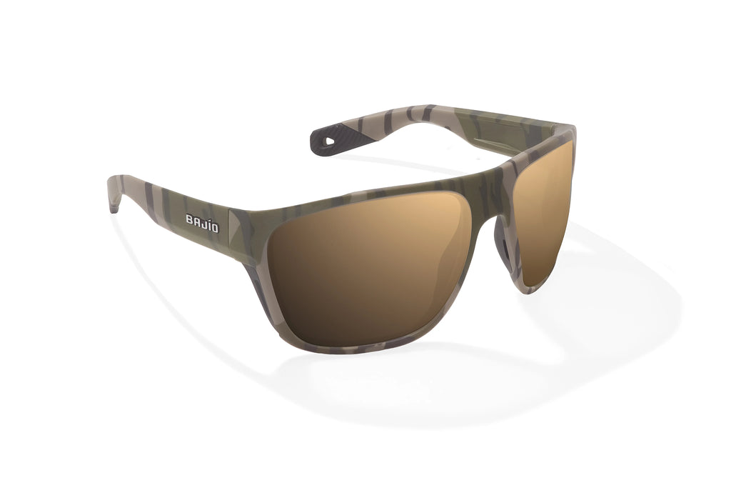 Angled view of Army Green Bottomlands Las Rocas in collaboration with Mossy Oak x Bajio tech angler sunglasses, bio-based nylon frames with copper polarized lenses, full wrap, extra large fit premium, built in sun ledge and flex hinges, ideal for fishing and outdoor use.