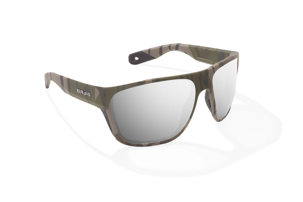 Angled view of Army Green Bottomlands Las Rocas in collaboration with Mossy Oak x Bajio tech angler sunglasses, bio-based nylon frames with silver mirror polarized lenses, full wrap, extra large fit premium, built in sun ledge and flex hinges, ideal for fishing and outdoor use.