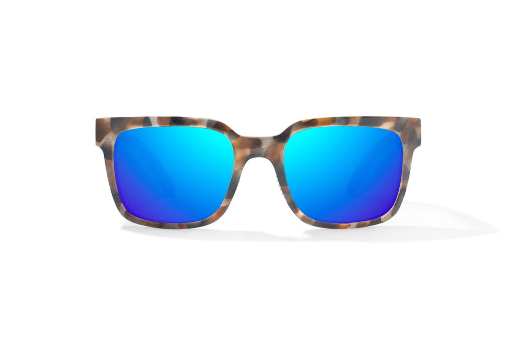 Front view of Tan Rock Gloss Paila Bajio beach sunglasses, bio-based nylon frames with blue mirror polarized lenses, extra large fit premium, built in sun ledge and sturdy barrel hinges, ideal for fishing and outdoor use.