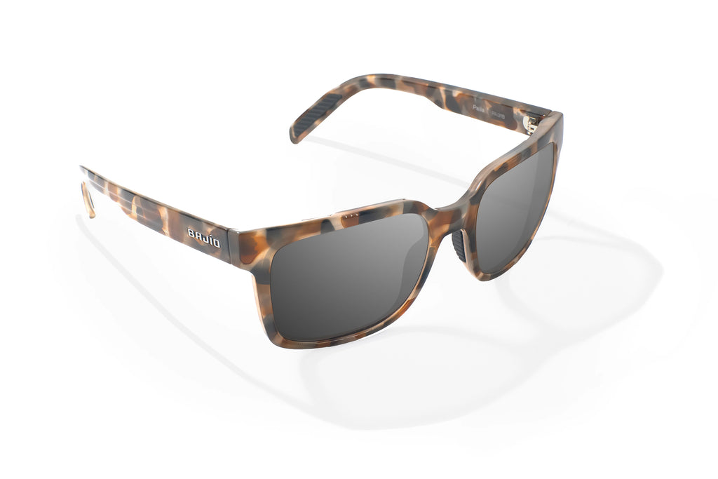 Angled view of Tan Rock Gloss Paila Bajio beach sunglasses, bio-based nylon frames with gray polarized lenses, extra large fit premium, built in sun ledge and sturdy barrel hinges, ideal for fishing and outdoor use.