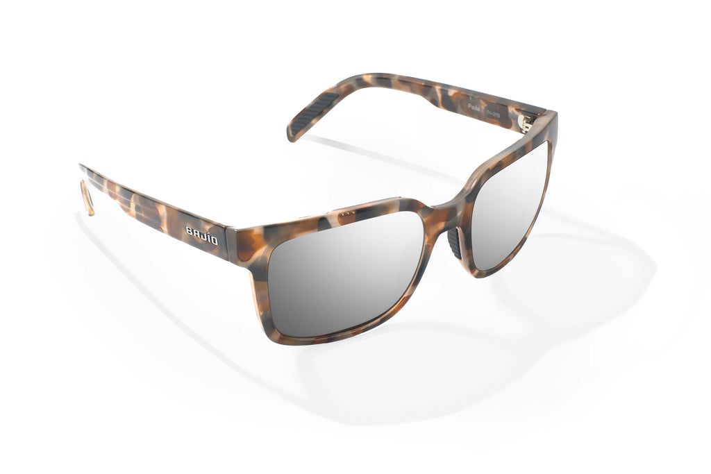 Angled view of Tan Rock Gloss Paila Bajio beach sunglasses, bio-based nylon frames with silver mirror polarized lenses, extra large fit premium, built in sun ledge and sturdy barrel hinges, ideal for fishing and outdoor use.