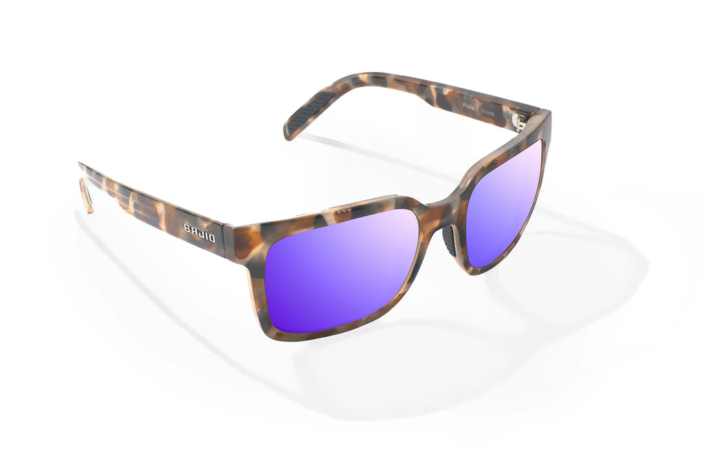 Angled view of Tan Rock Gloss Paila Bajio beach sunglasses, bio-based nylon frames with violet mirror polarized lenses, extra large fit premium, built in sun ledge and sturdy barrel hinges, ideal for fishing and outdoor use.