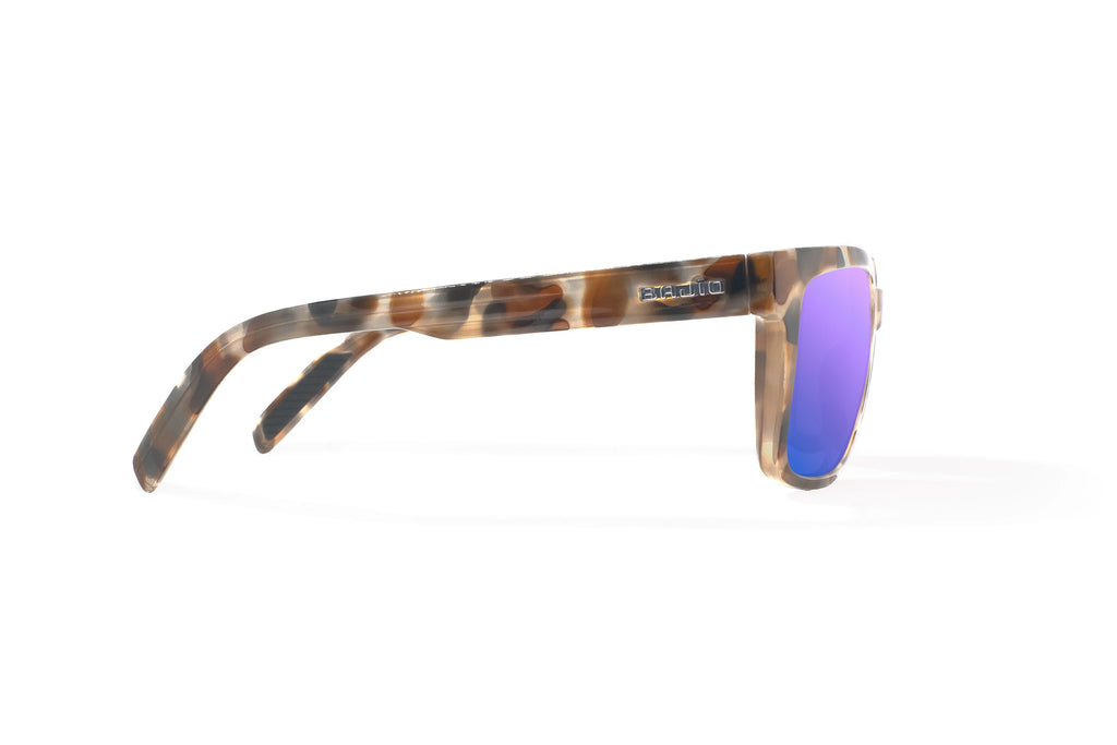Side view of Tan Rock Gloss Paila Bajio beach sunglasses, bio-based nylon frames with violet mirror polarized lenses, extra large fit premium, built in sun ledge and sturdy barrel hinges, ideal for fishing and outdoor use.