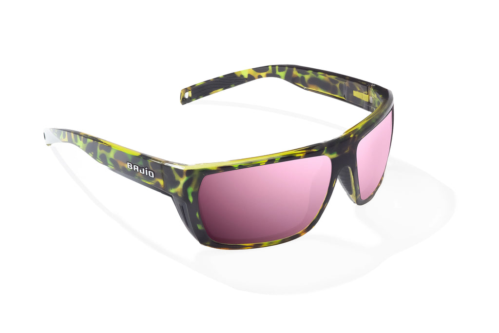 Angled view of Green Rock Gloss Palometa Bajio tech angler sunglasses, bio-based nylon frames with rose mirror polarized lenses, full wrap, medium fit, premium built in sun ledge and flex hinges, ideal for fishing and outdoor use.