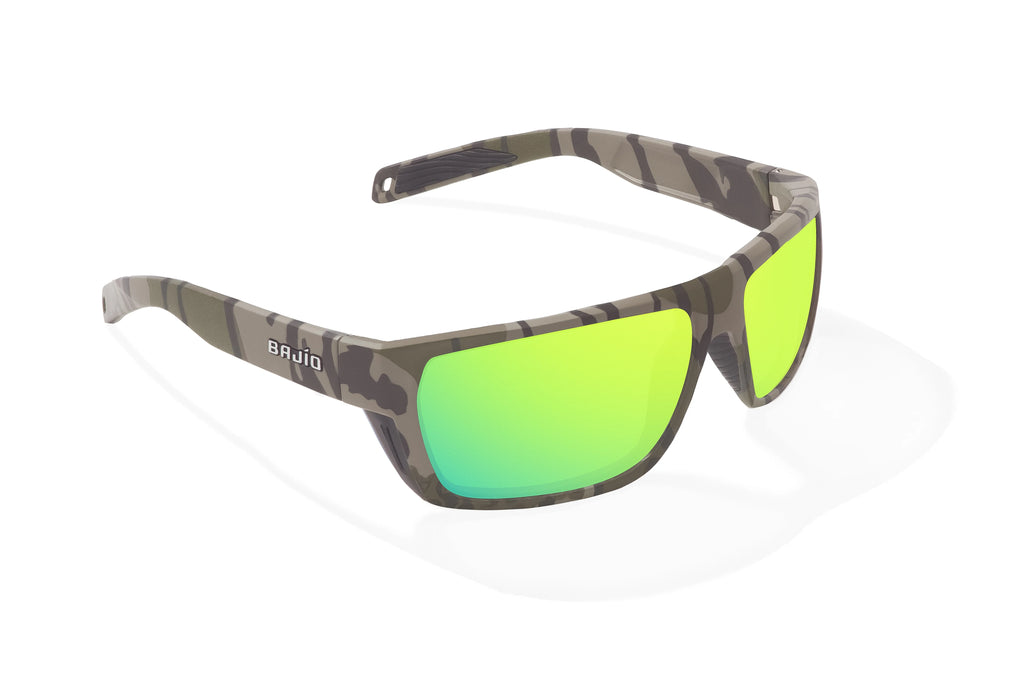 Angled view of Army Green Bottomlands Palometa in collaboration with Mossy Oak x Bajio tech angler sunglasses, bio-based nylon frames with green mirror polarized lenses, full wrap, medium fit, premium built in sun ledge and flex hinges, ideal for fishing and outdoor use.