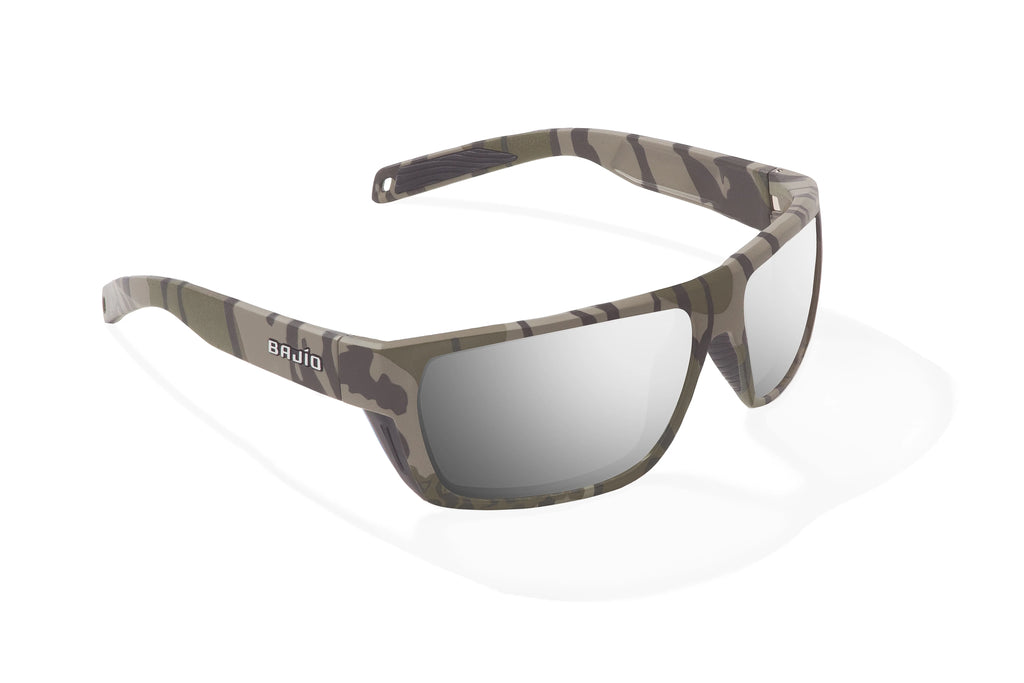 Angled view of Army Green Bottomlands Palometa in collaboration with Mossy Oak x Bajio tech angler sunglasses, bio-based nylon frames with silver mirror polarized lenses, full wrap, medium fit, premium built in sun ledge and flex hinges, ideal for fishing and outdoor use.