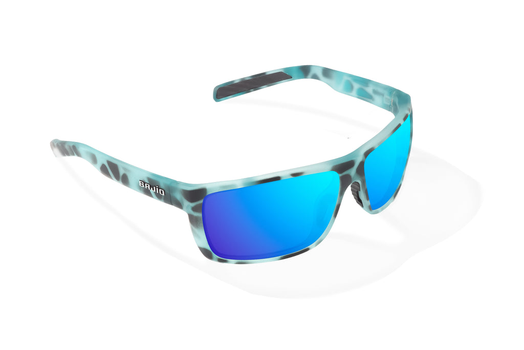 Angled view of Light Blue Water Matte Sigs Bajio tight line sunglasses, bio-based nylon frames with blue mirror polarized lenses, full wrap, medium fit, premium built in sun ledge and flex hinges, ideal for fishing and outdoor use.