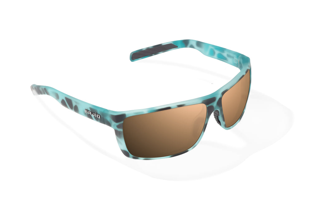 Angled view of Light Blue Water Matte Sigs Bajio tight line sunglasses, bio-based nylon frames with copper polarized lenses, full wrap, medium fit, premium built in sun ledge and flex hinges, ideal for fishing and outdoor use.