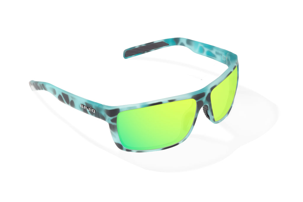 Angled view of Light Blue Water Matte Sigs Bajio tight line sunglasses, bio-based nylon frames with green mirror polarized lenses, full wrap, medium fit, premium built in sun ledge and flex hinges, ideal for fishing and outdoor use.