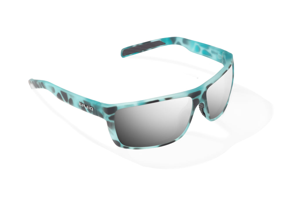 Angled view of Light Blue Water Matte Sigs Bajio tight line sunglasses, bio-based nylon frames with silver mirror polarized lenses, full wrap, medium fit, premium built in sun ledge and flex hinges, ideal for fishing and outdoor use.