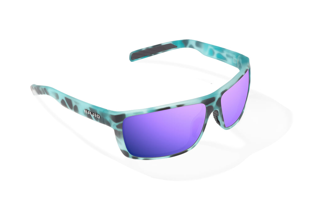 Angled view of Light Blue Water Matte Sigs Bajio tight line sunglasses, bio-based nylon frames with violet mirror polarized lenses, full wrap, medium fit, premium built in sun ledge and flex hinges, ideal for fishing and outdoor use.