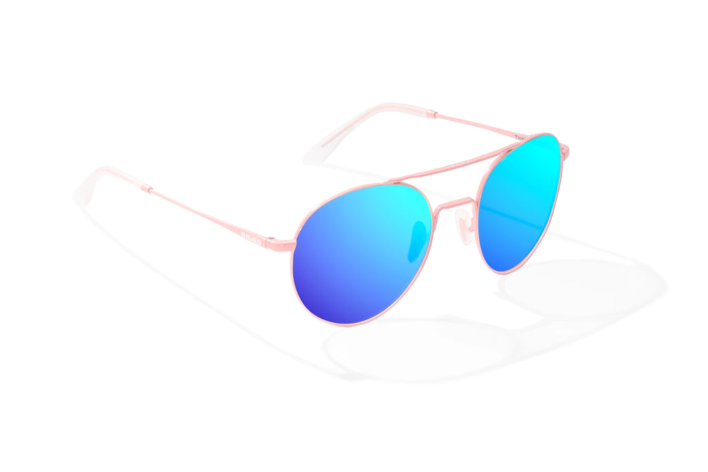 Angled side view of Light pink metal Tionia Bajio sunglasses with blue mirror polarized lenses, small-fit vintage frames for narrow faces, ideal for fishing and outdoor use.