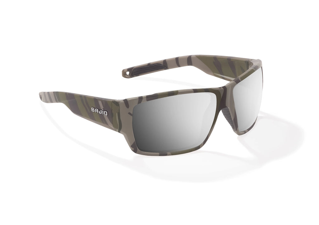 Angled view of Army Green Bottomlands Vega in collaboration with Mossy Oak x Bajio wide body sunglasses, bio-based nylon frames with silver mirror polarized lenses, full wrap, large fit, premium built in sun ledge and flex hinges, ideal for fishing and outdoor use.