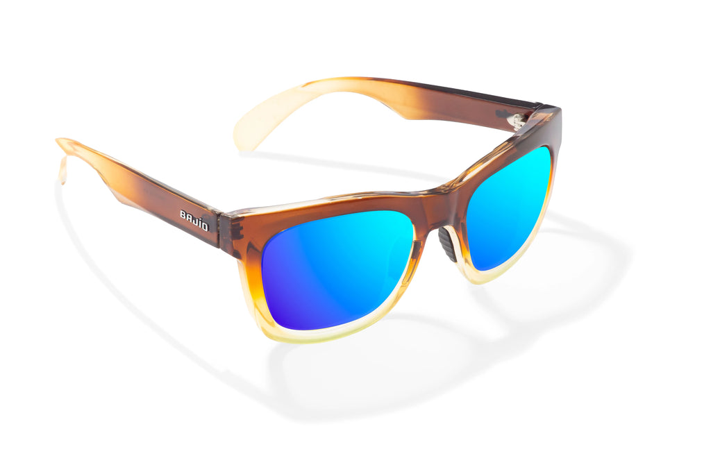 Angled view of Brown Green Sky Gloss Cometa Bajio beach sunglasses, bio-based nylon frames with blue mirror polarized lenses, medium wrap, medium fit premium, built in sun ledge and sturdy barrel hinges, ideal for fishing and outdoor use.