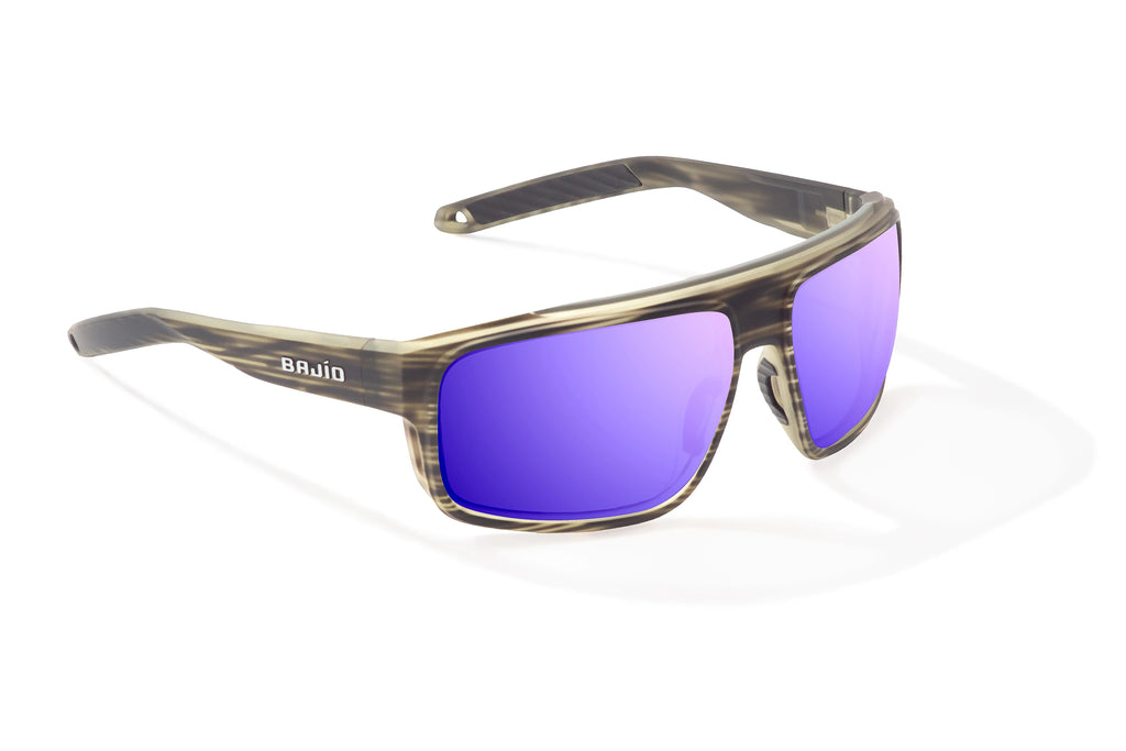 Angled view of Gray Grass Matte Greenland Bajio tech angler sunglasses, bio-based nylon frames with violet mirror polarized lenses, full wrap, large fit, premium built in sun ledge and flex hinges, ideal for fishing and outdoor use.