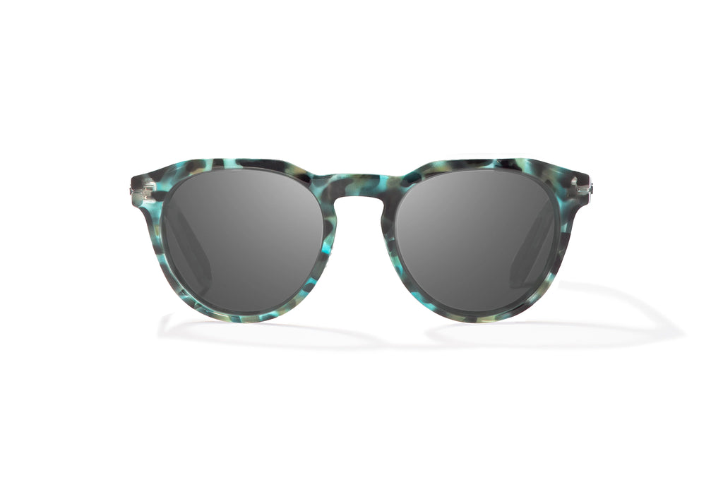 Front view of Blue Rock Gloss Paraiso Bajio beach sunglasses, bio-based nylon frames with gray polarized lenses, medium wrap, small fit premium, built in sun ledge and sturdy barrel hinges, ideal for fishing and outdoor use.