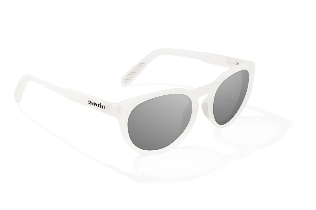 Angled view of White Glass Gloss Paraiso Bajio beach sunglasses, bio-based nylon frames with gray polarized lenses, medium wrap, small fit premium, built in sun ledge and sturdy barrel hinges, ideal for fishing and outdoor use.