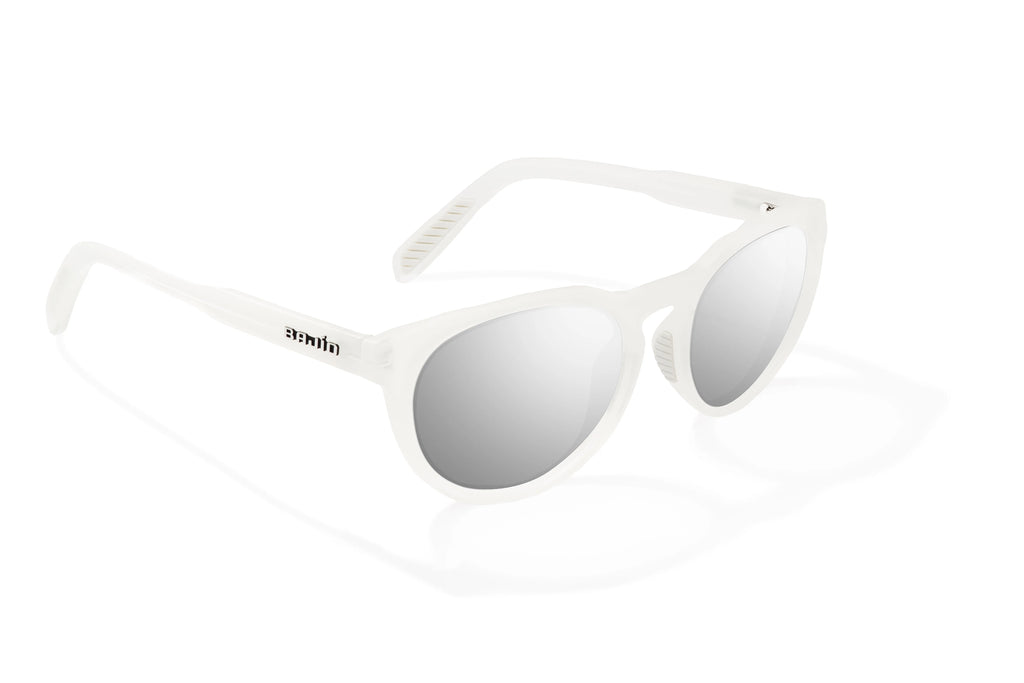 Angled view of White Glass Gloss Paraiso Bajio beach sunglasses, bio-based nylon frames with silver mirror polarized lenses, medium wrap, small fit premium, built in sun ledge and sturdy barrel hinges, ideal for fishing and outdoor use.