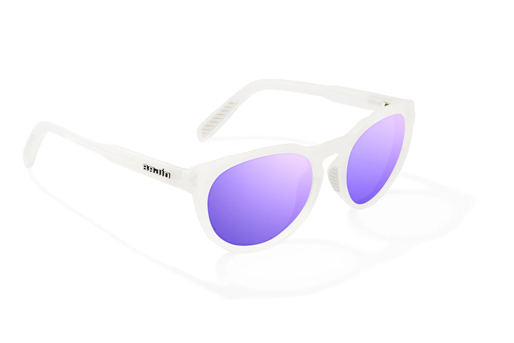 Angled view of White Glass Gloss Paraiso Bajio beach sunglasses, bio-based nylon frames with violet mirror polarized lenses, medium wrap, small fit premium, built in sun ledge and sturdy barrel hinges, ideal for fishing and outdoor use.